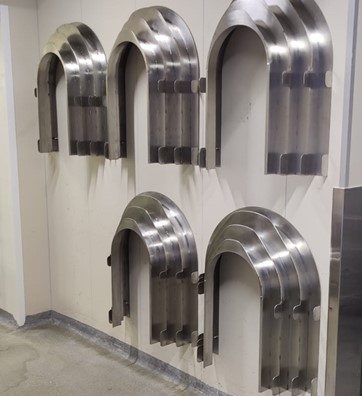 Support mural sur-mesure pour tout type de flexibles
